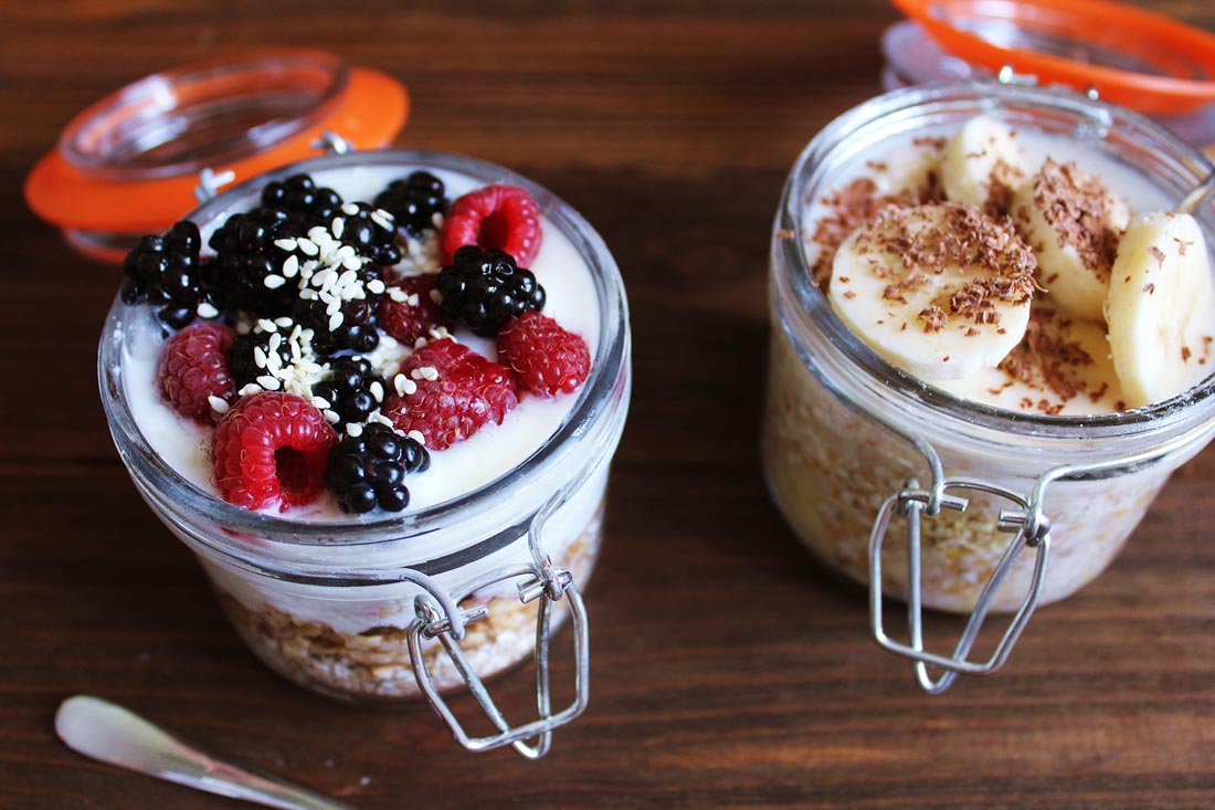 Image of two glass jars full of yogurt and fruit